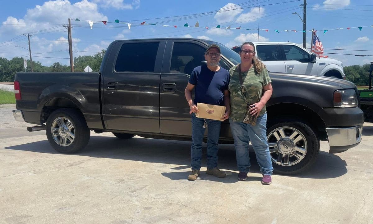 A Cowtown Auto Group customer picking up their vehicle