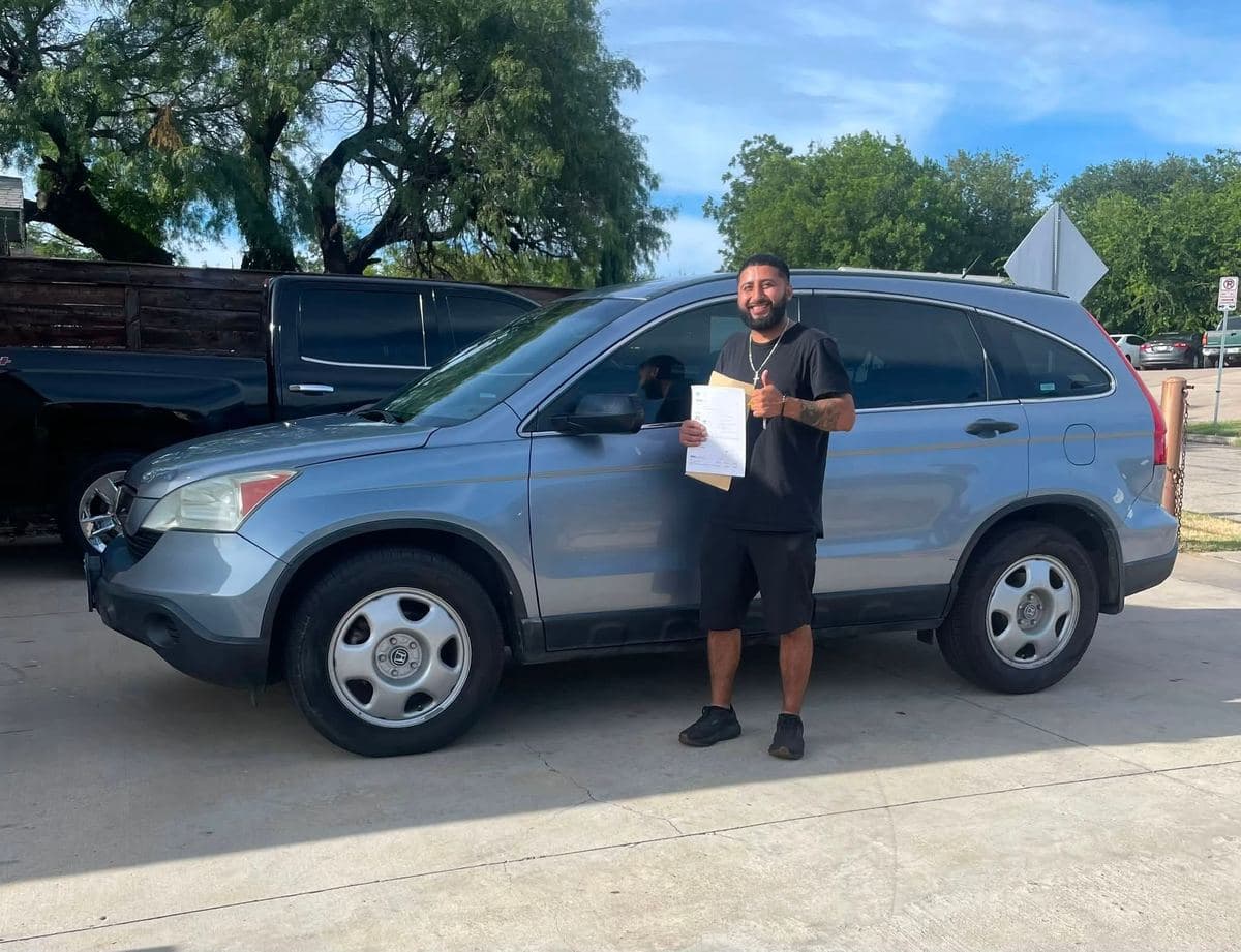 A Cowtown Auto Group customer picking up their vehicle (photo 4)