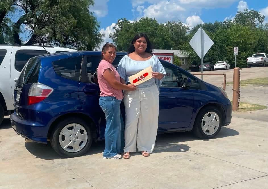 A Cowtown Auto Group customer picking up their vehicle (photo 6)