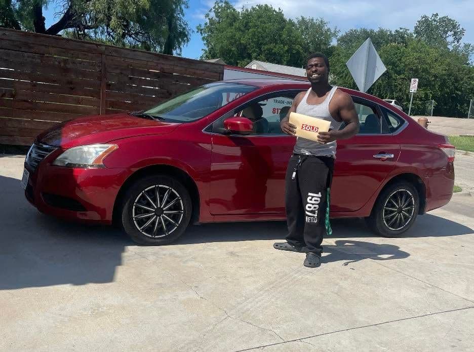 A Cowtown Auto Group customer picking up their vehicle (photo 7)