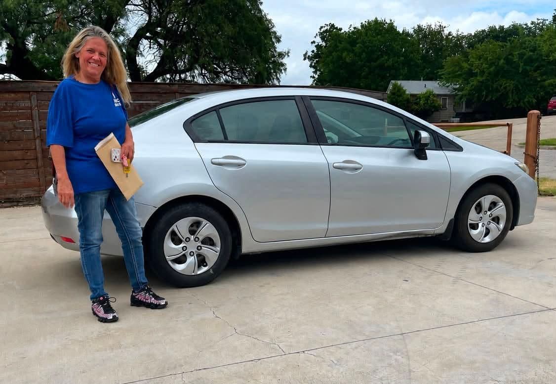 A Cowtown Auto Group customer picking up their vehicle (photo 8)