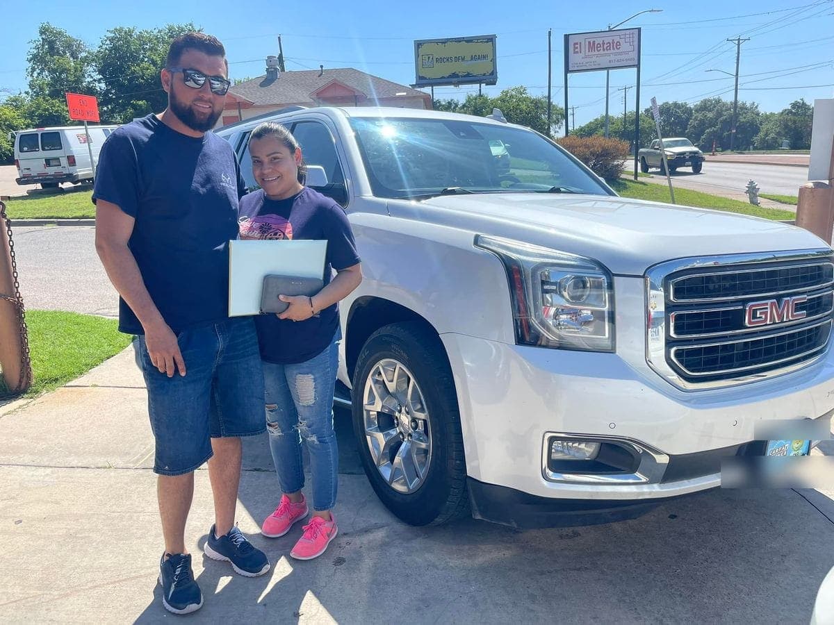 A Cowtown Auto Group customer picking up their vehicle (photo 9)