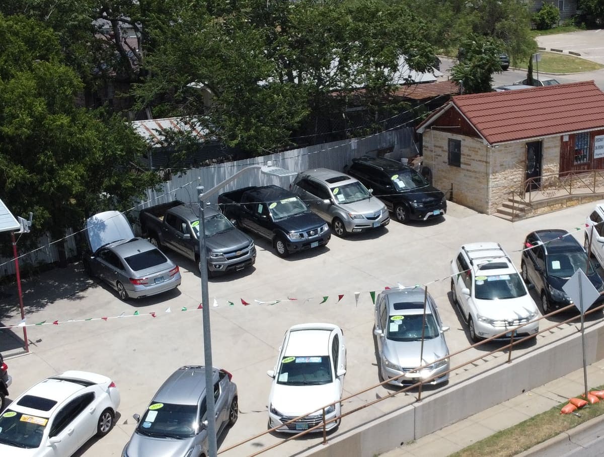 Aerial photo of the Cowtown Auto Group lot and stone building on NE 28th Street in Fort Worth